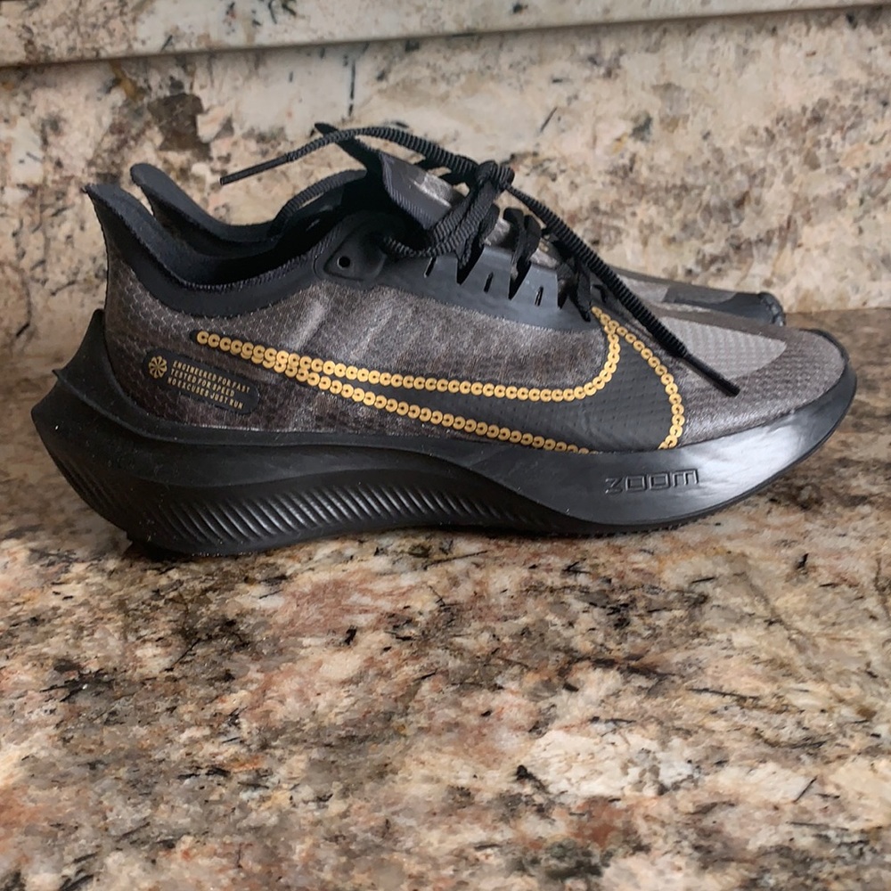 Zoom Gravity Nike running shoes.